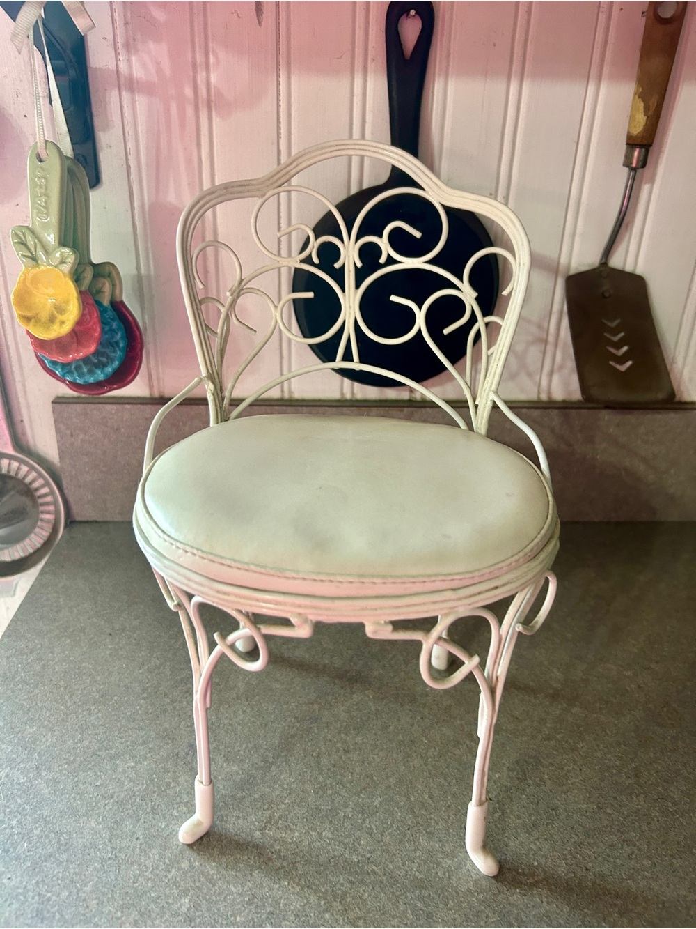 White Metal Scrollwork Accent Chair with Padded Seat plant holder